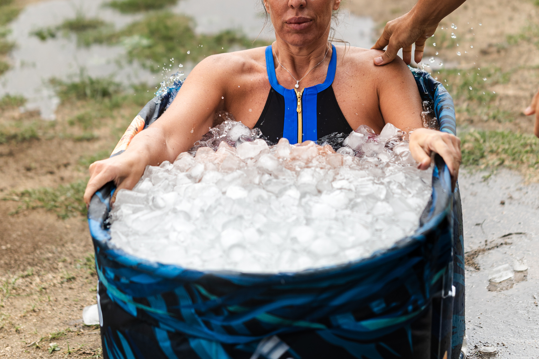 Athlete taking ice bath after running workout