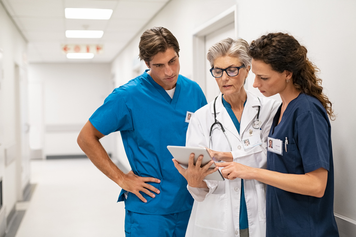 Doctor talking with care team